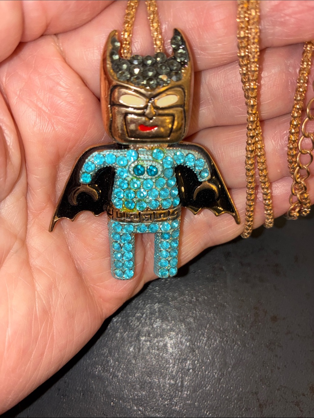 Gold-Tone Batman Pendant/Brooch Necklace with Turquoise Crystals